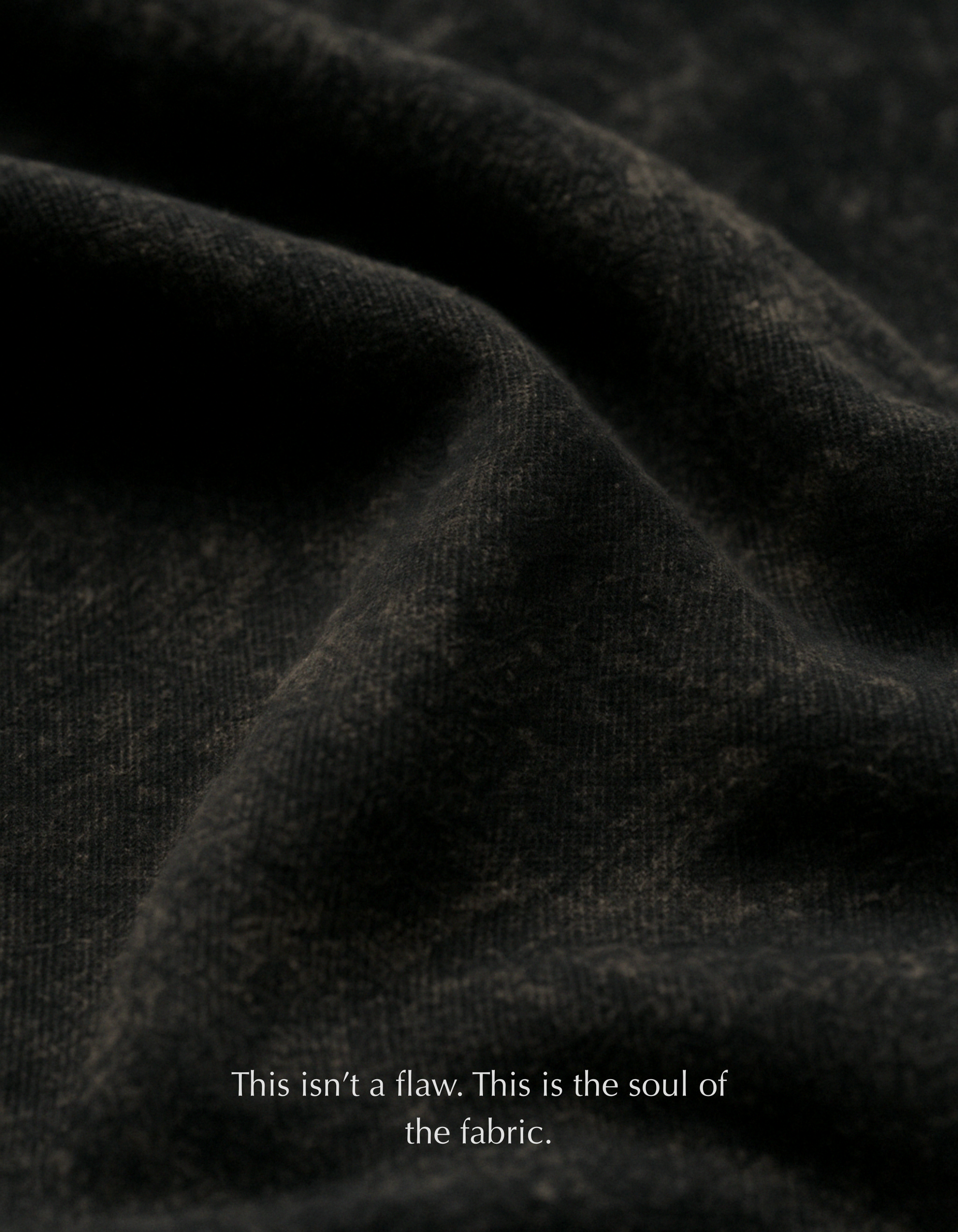 Close-up of premium acid-washed cotton fabric on the Aham Brahmasmi Acid Tee, showing texture and softness.
