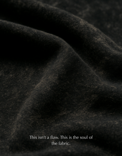 Close-up of premium acid-washed cotton fabric on the Aham Brahmasmi Acid Tee, showing texture and softness.